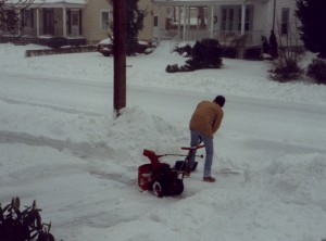 Brett shoveling snow